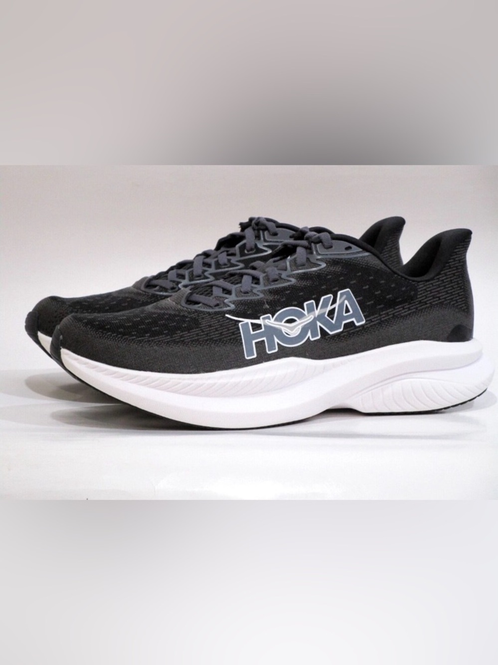 Hoka  womens Black and White Running Shoe